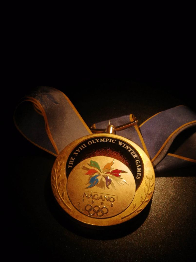 zlatá medaile z Nagana