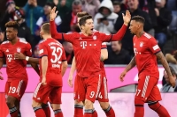 Útočník Bayernu Mnichov Robert Lewandowski slaví gól do sítě Mohuče